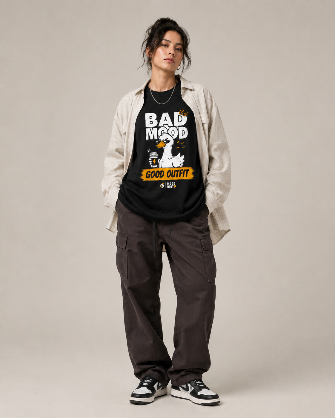 MOOD RIOT tee styled with layered streetwear