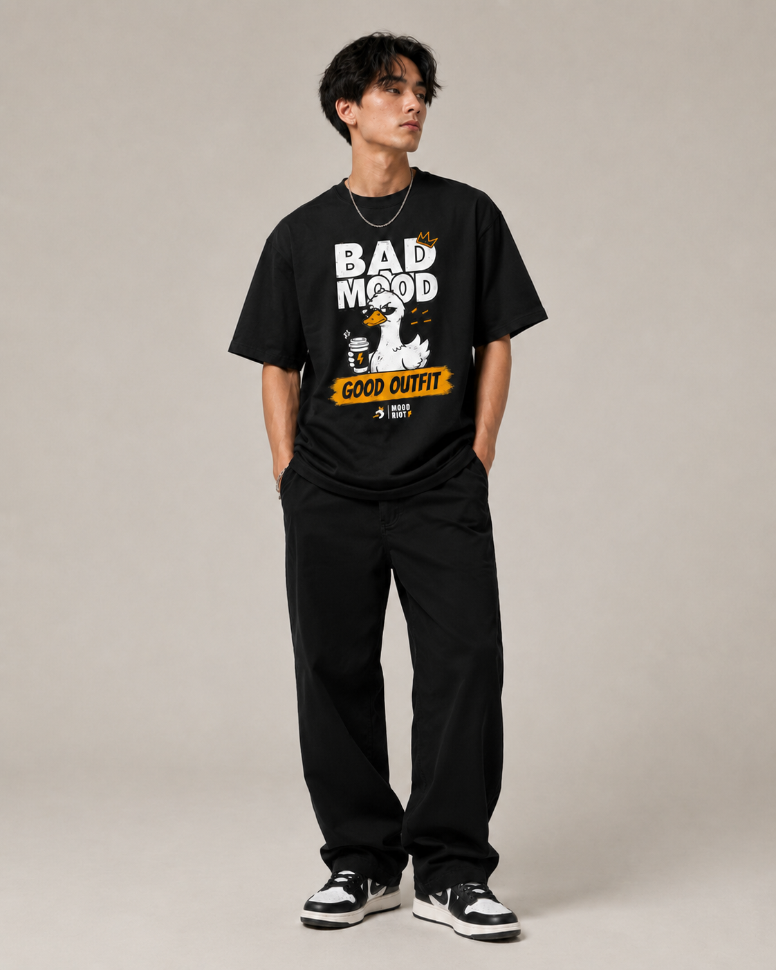MOOD RIOT tee styled as a relaxed oversized street fit
